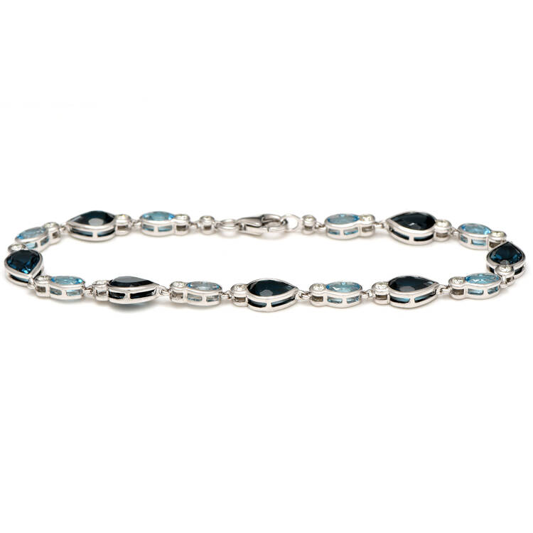 14KW Blue Topaz (8.20) & Diamond (0.50) Line Bracelet
