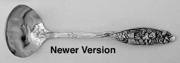 Labors of Cupid (Sterling, Newer) Solid Piece Cream Ladle