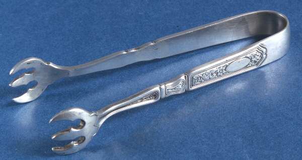 St. Dunstan Chased (Sterling, 1917) Small Sugar Tongs