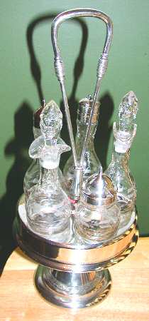 0586 (Silverplate, Hollowware) Cruet Set (5 Crystal Bottles with Stand)