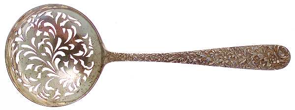 Repousse (Sterling, 1896, 925-1000) Large Pierced Pea Serving Spoon
