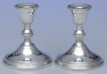 58 (Sterling, Hollowware) Pair of 4" Weighted Candlesticks