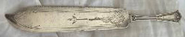 Egyptian (Sterling, 1875) Solid Bright Cut Cake Saw