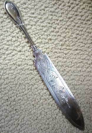 Italian (Sterling, 1880) Solid Bright Cut Cake Saw