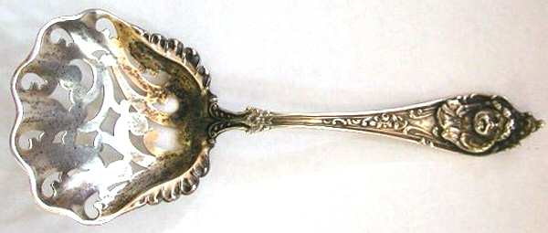 Cherub (Sterling, 1895) Pierced Almond Spoon