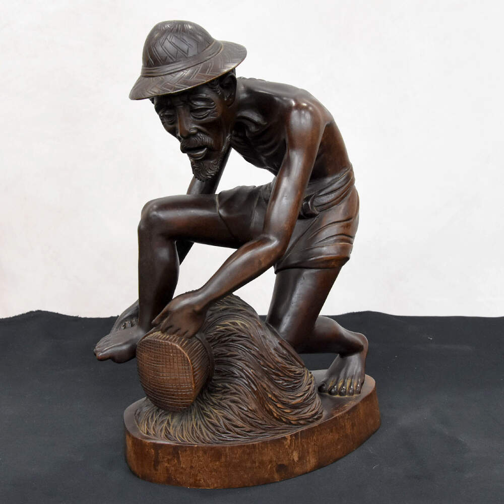 Hancock Wooden Figure of a Fisherman from Bali-1