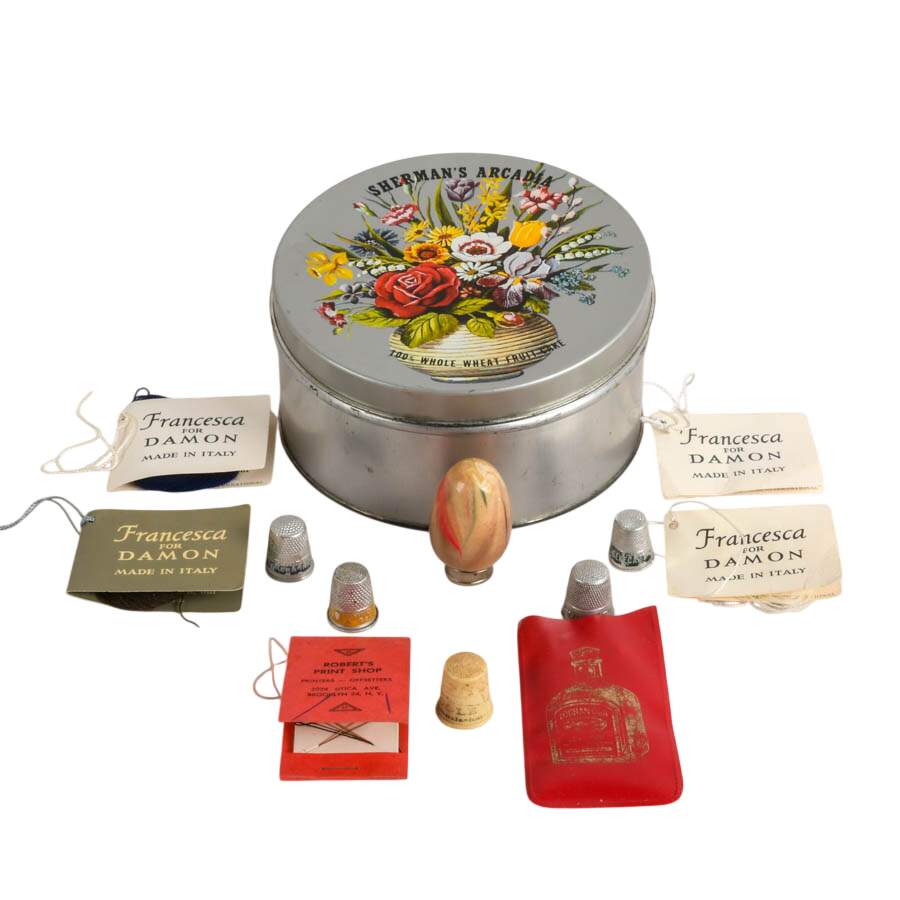 Vintage Thirteen-Piece Fruit Cake Tin with Period Mending Supplies-1