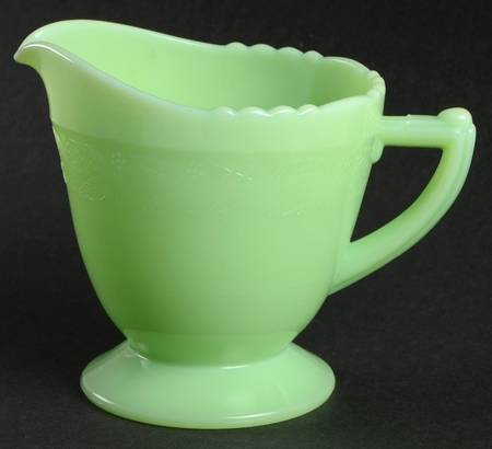 A McKee Laurel Jadite green creamer listed at $59.99 in September 2026
